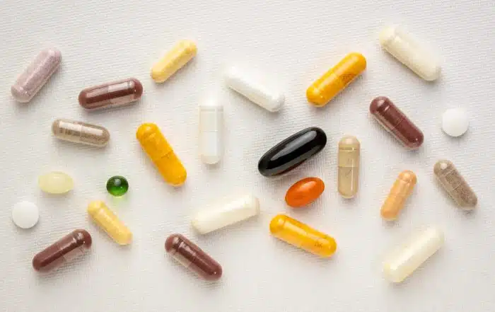 Vitamins and supplements on a white background