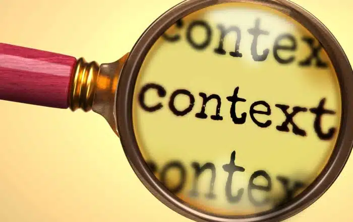 Examine and study context, showed as a magnify glass and word context to symbolize process of analyzing, exploring, learning and taking a closer look at context, 3d illustration.