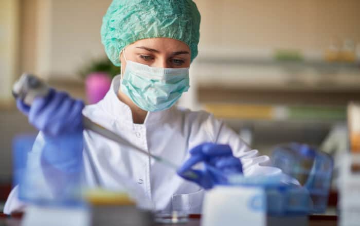 female scientict making research in lab analyzing acetaminophen and leucovorin