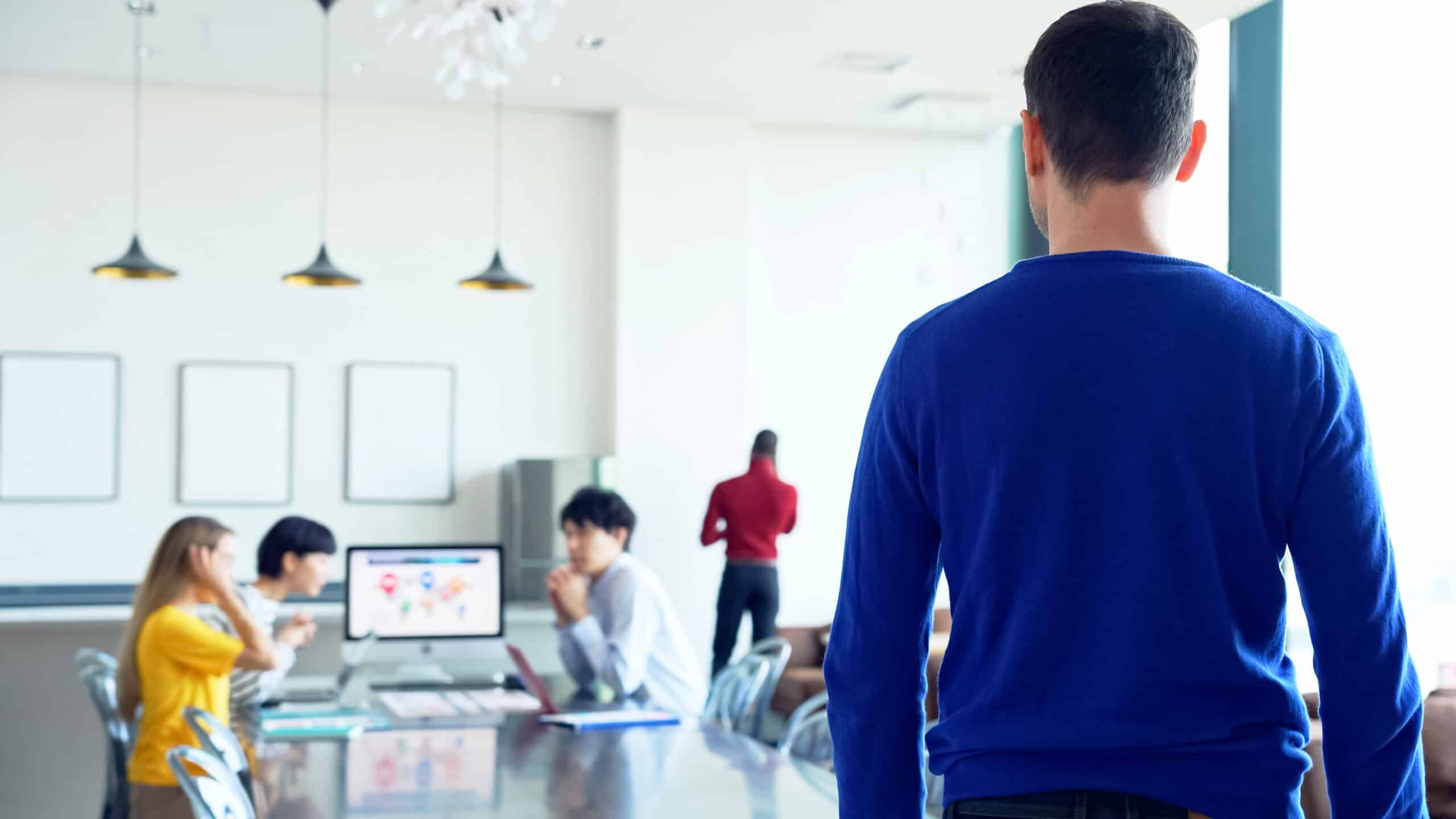 Office environment with a group of professionals working together