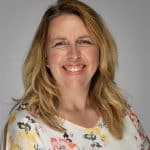 Professional headshot of webinar speaker