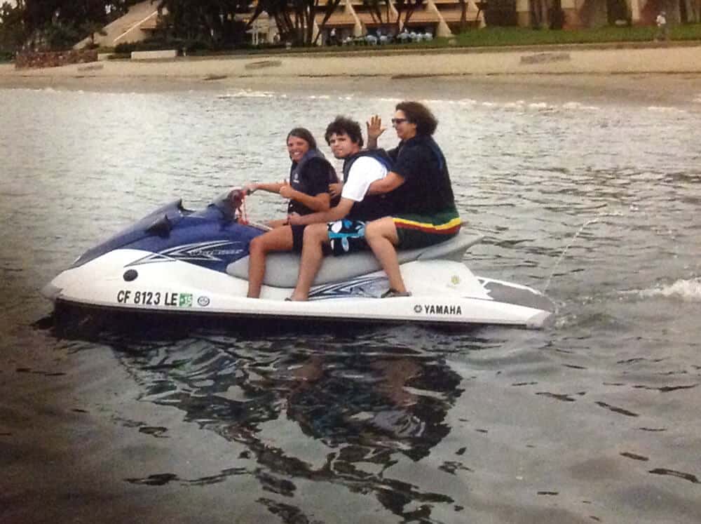 3 adults are on jetski