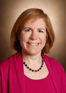 Professional headshot of a person