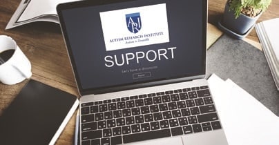 laptop with ari logo on the screen