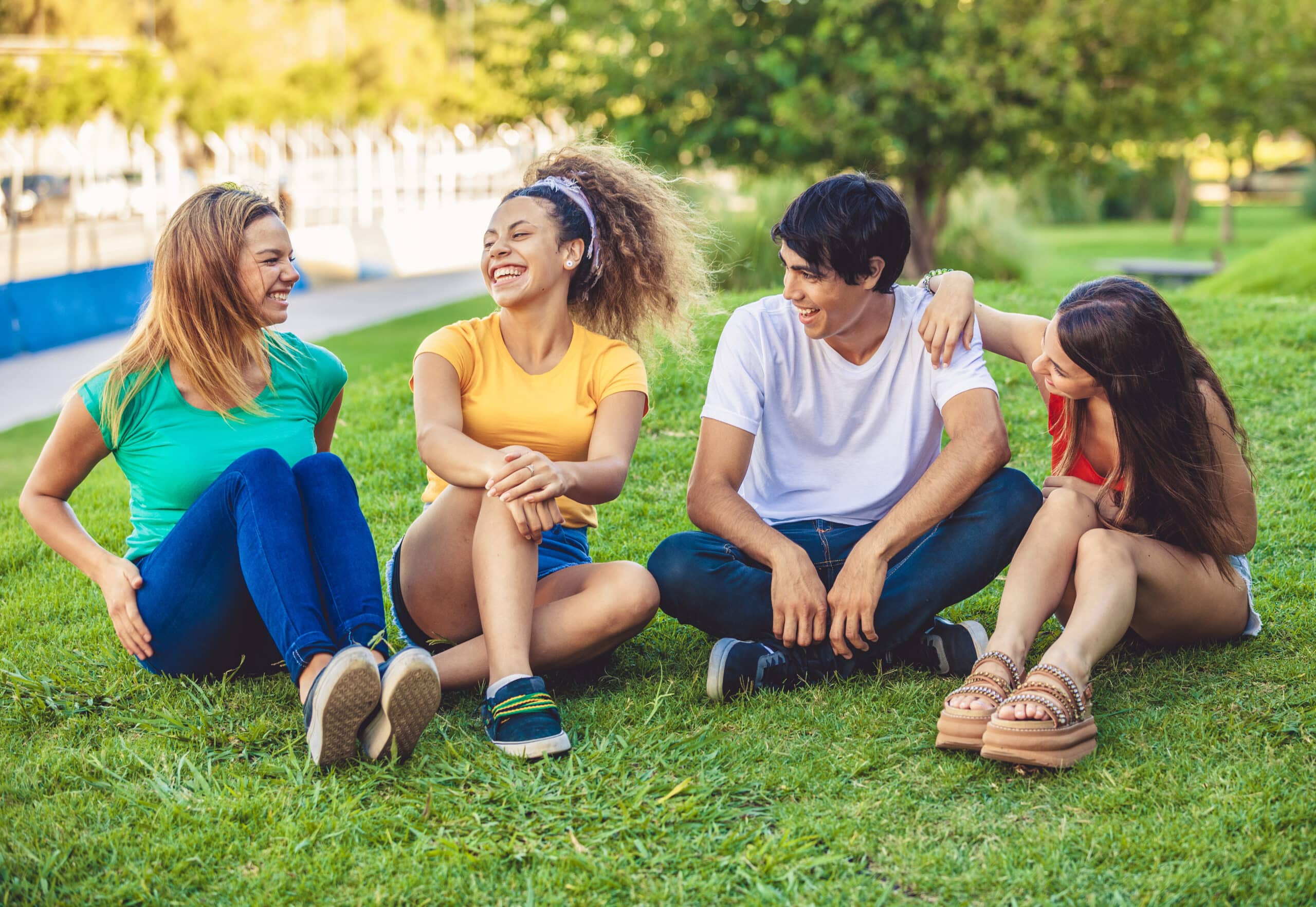 Group of happy teenagers in the park
