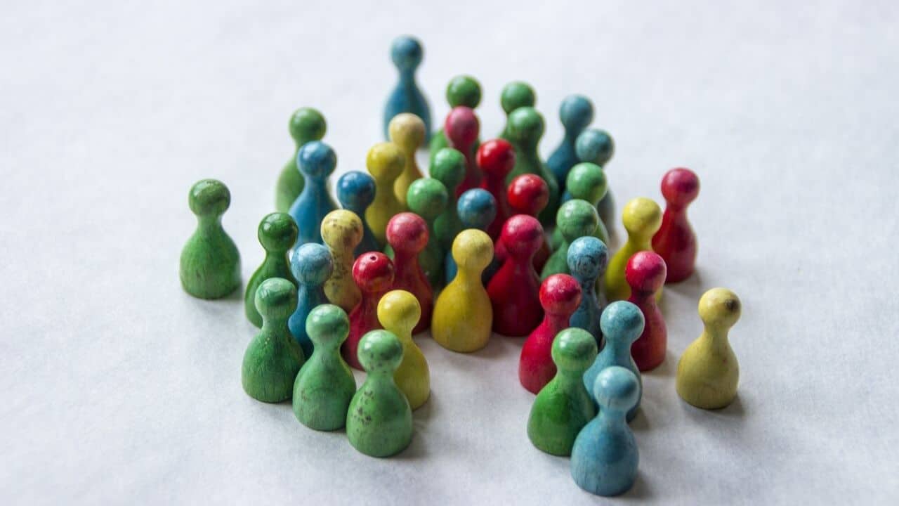 Diverse figures in a range of colors displayed together