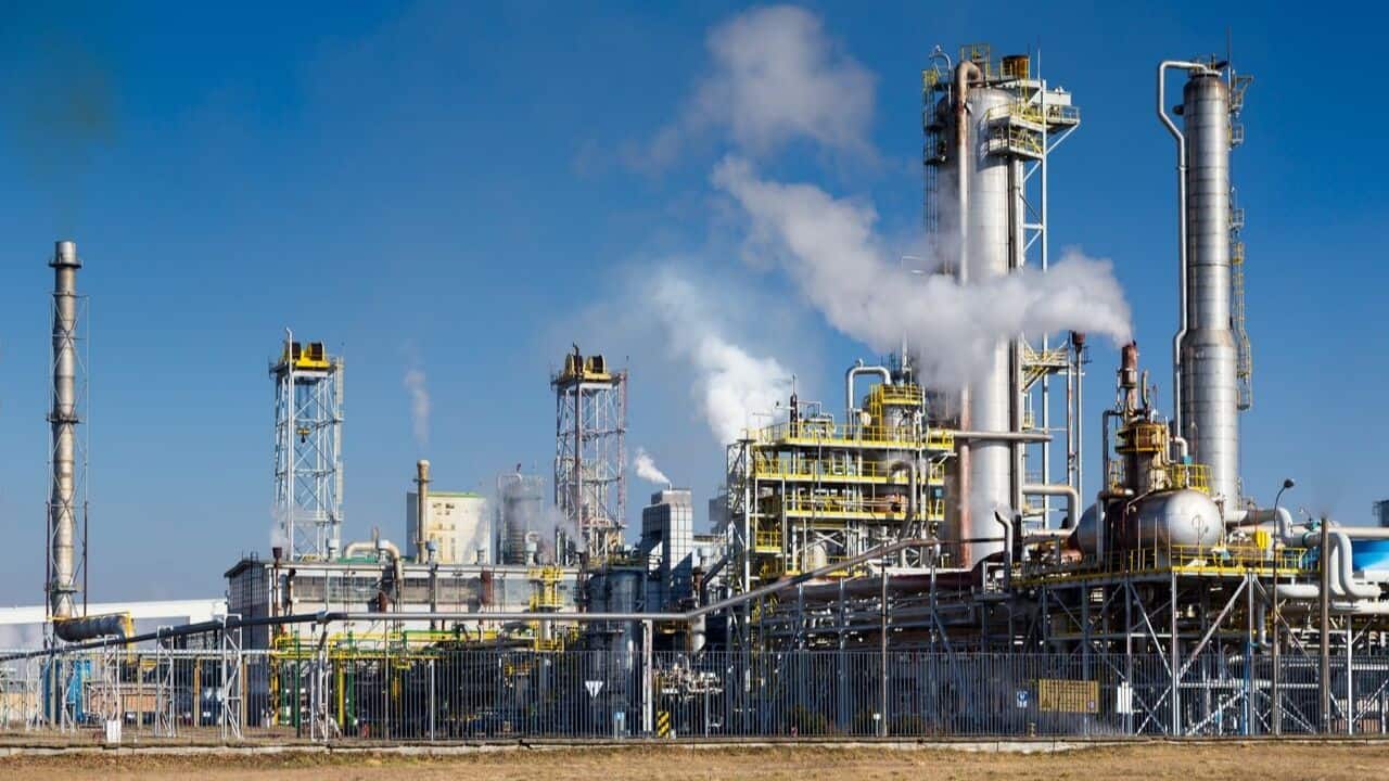 Industrial factories releasing environmental toxins into the air