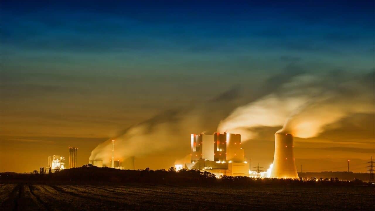 Industrial factories releasing environmental toxins into the air