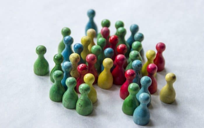 Diverse figures in a range of colors displayed together