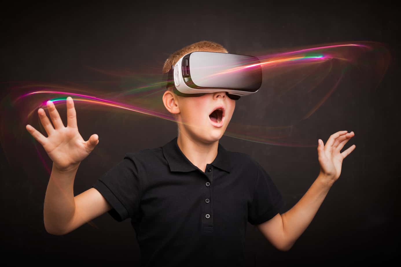 Child experiencing virtual reality with VR goggles